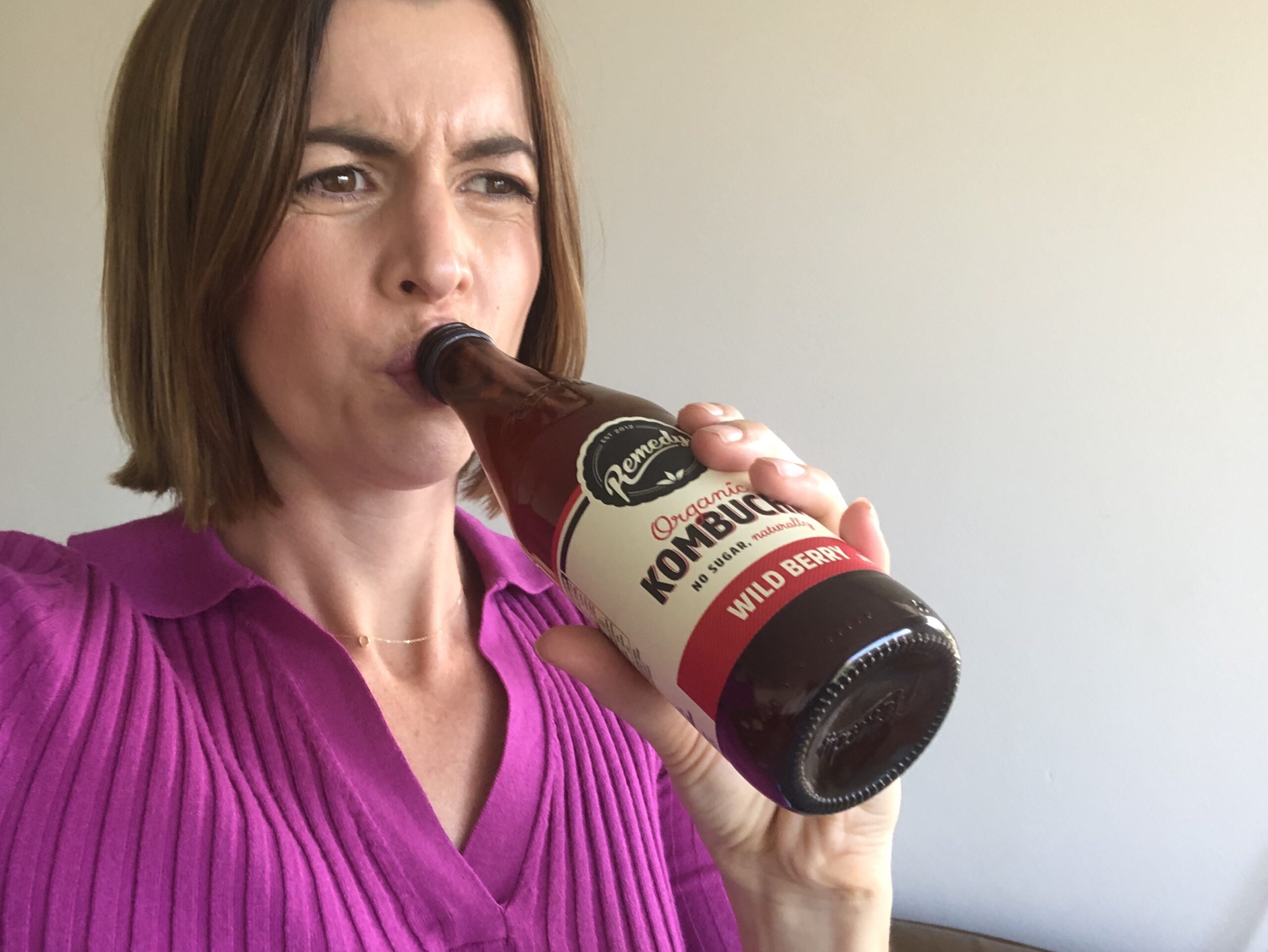 Woman drinking Kombucha