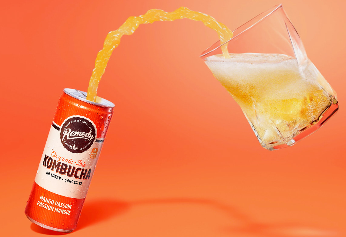 Remedy Kombucha Mango Passion pouring image