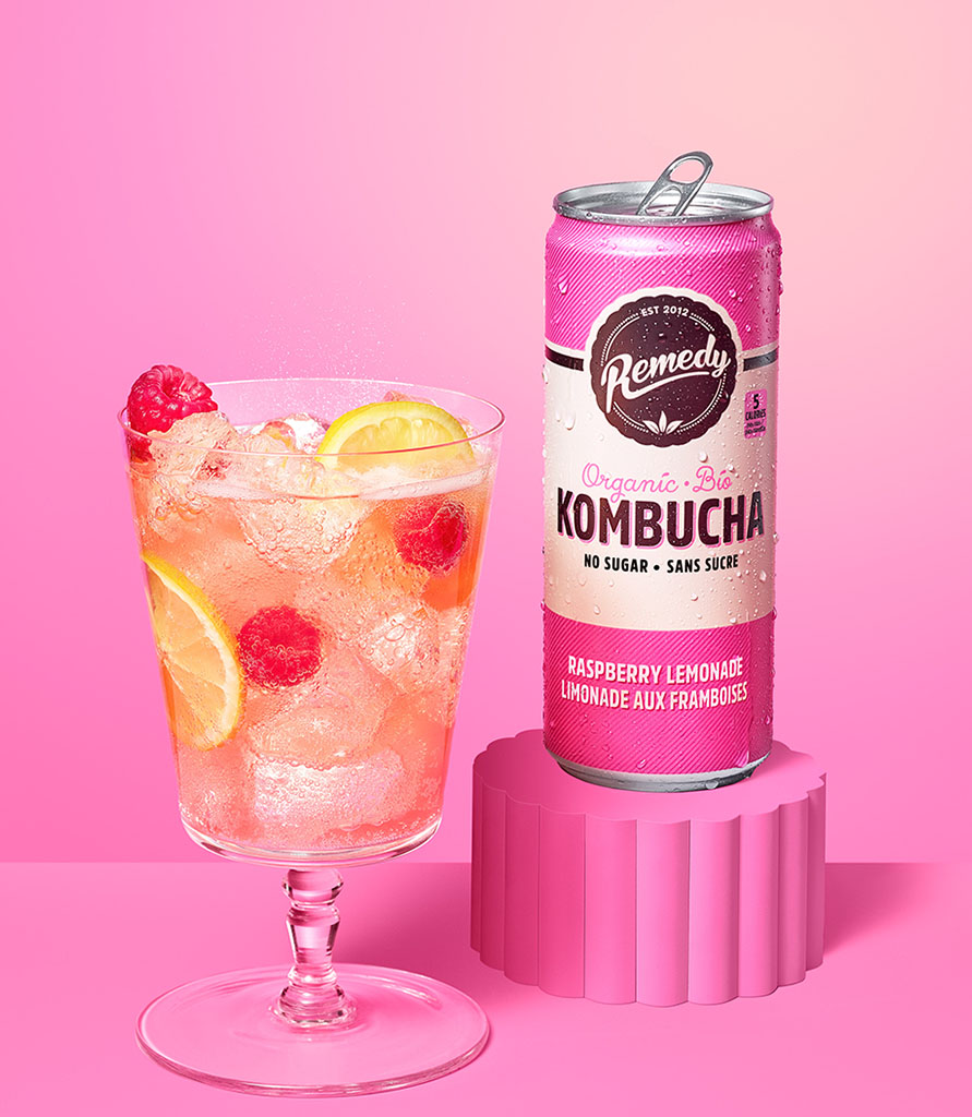 Remedy Kombucha Raspberry Lemonade can with glass 